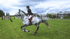 A photo of a horse rider with protective gear